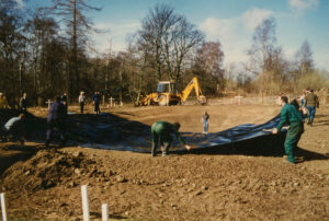 Beginning to lay the pond liner